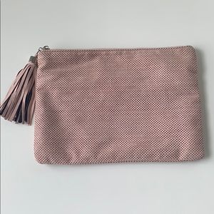 Light pink suede tassel clutch
